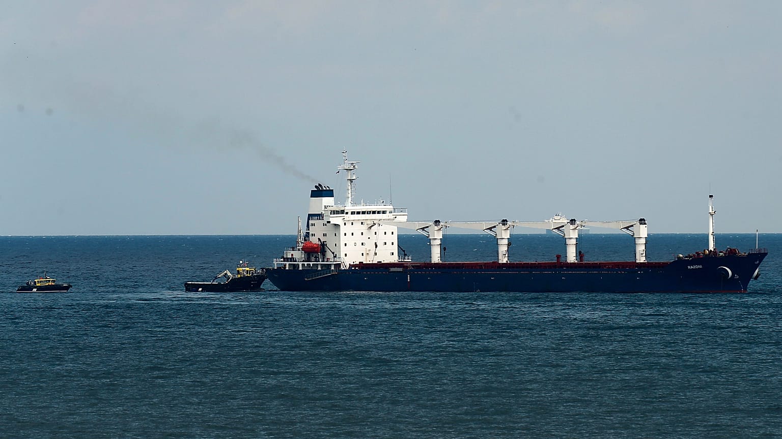 An inspection boat heads to the Razoni to check if the grain shipment is in accordance with the Black Sea grain deal off the coast of Istanbul, 3 August, 2022