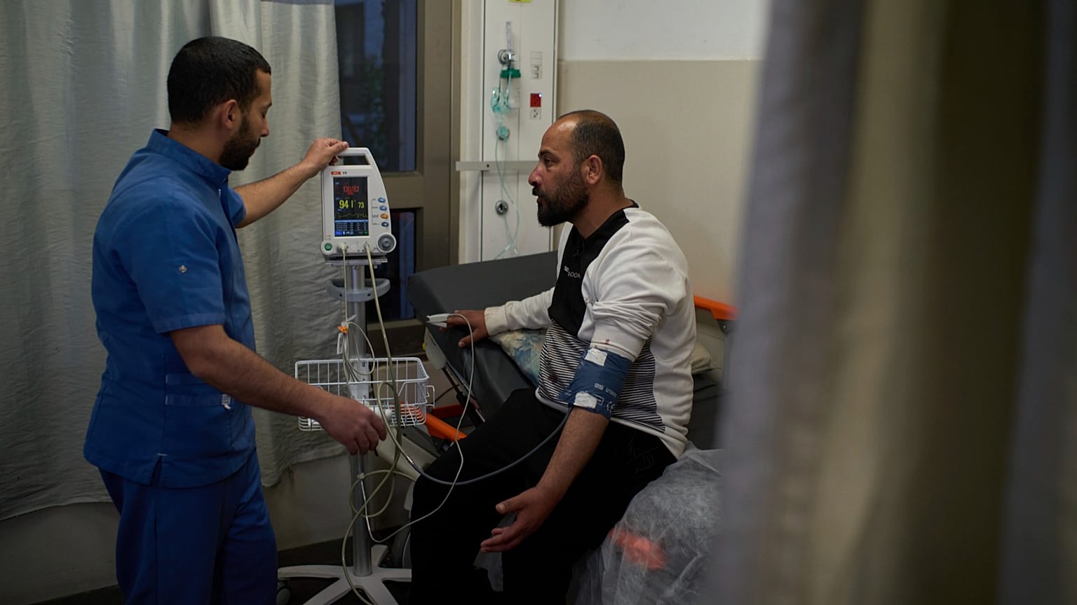 Hamdan Ballal, co-director of No Other Land, being checked at a Hebron hospital after being detained by the Israeli army, 25 March 2025.