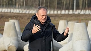 FILE - Poland's Prime Minister Donald Tusk speaks to reporters in Dabrowka, Poland, during a visit to Poland's border with Russia on Saturday Nov. 30, 2024.