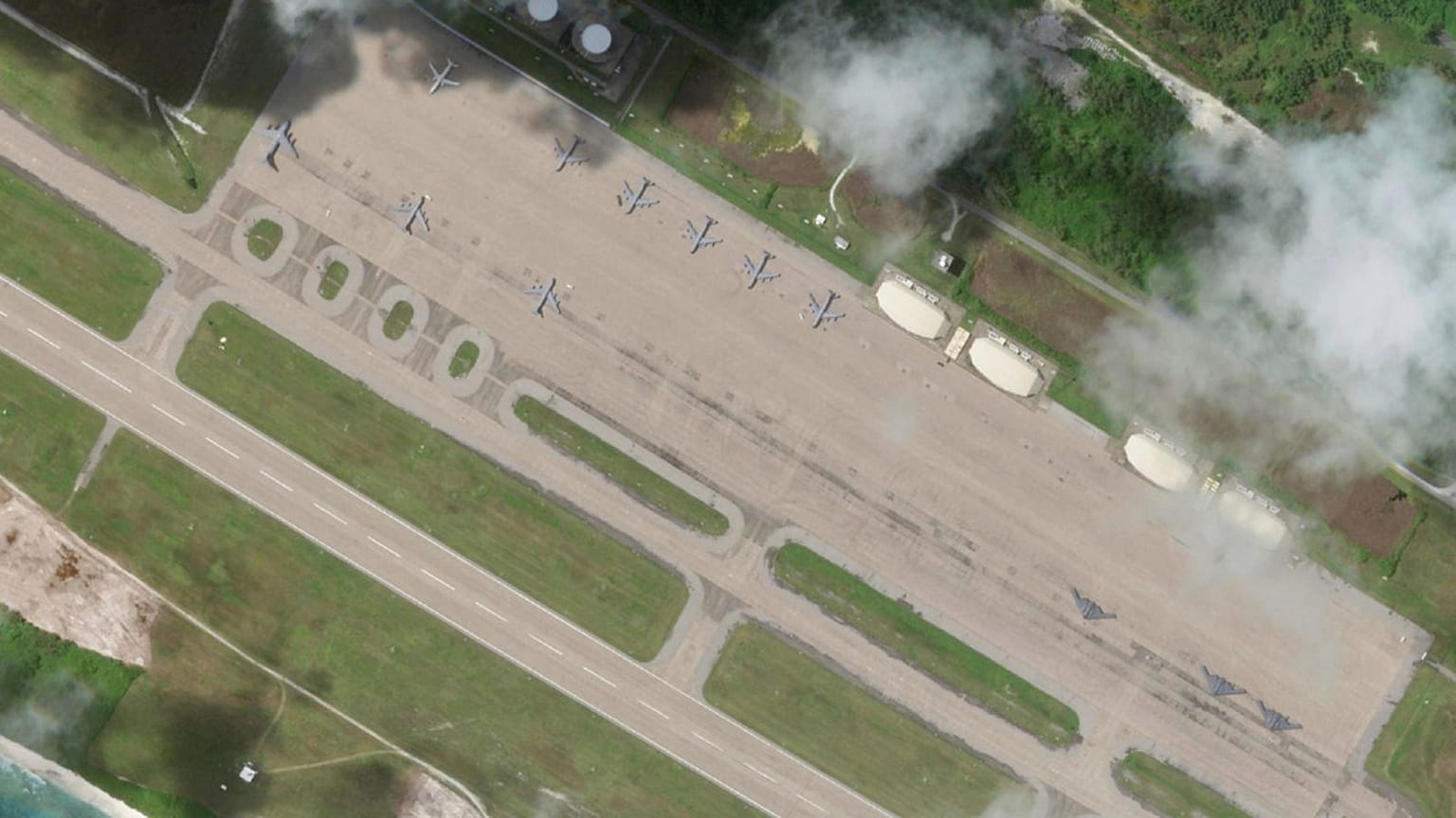 B-2 stealth bombers, right side, parked at Camp Thunder Cove in Diego Garcia