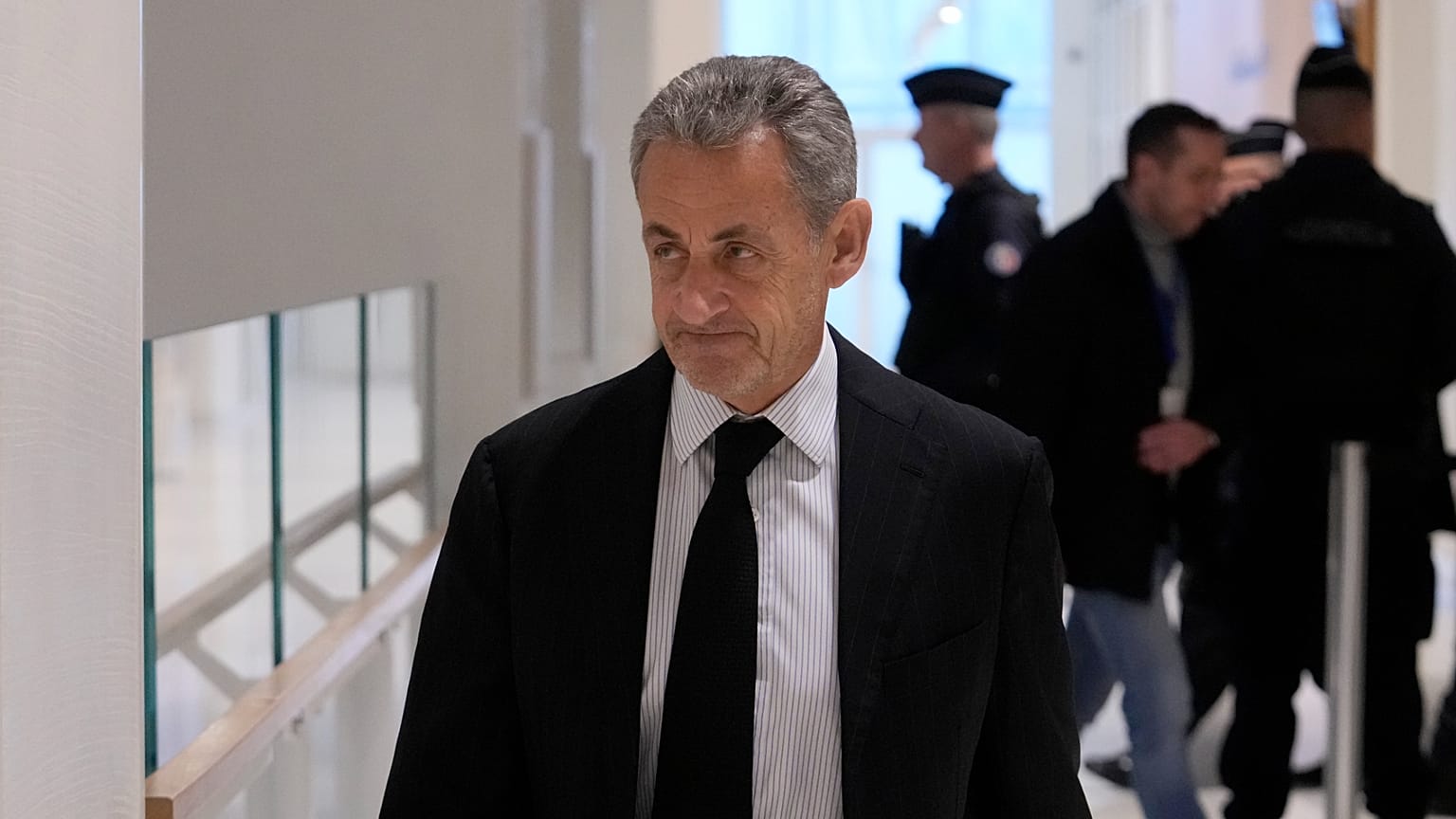 Former French President Nicolas Sarkozy arrives at the courthouse for his trial over alleged illegal financing of his 2007 presidential campaign, 15 January, 2025