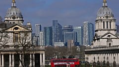 The Old Royal Naval College in Greenwich frames buildings in London's financial area Canary Wharf, in London