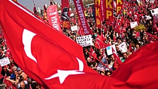 People listen to speeches during a rally called by the CHP against the arrest of Istanbul's Mayor Ekrem İmamoğlu in Istanbul, 29 March, 2025
