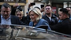 Marine Le Pen leaves the National Rally headquarters in Paris after a French court convicted her of embezzlement, 31 March, 2025