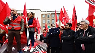 A protest organised by the CGIL trade union in front of the Latina court south of Rome.