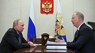 Vlagyimir Putyin és Kirill Dimitrijev