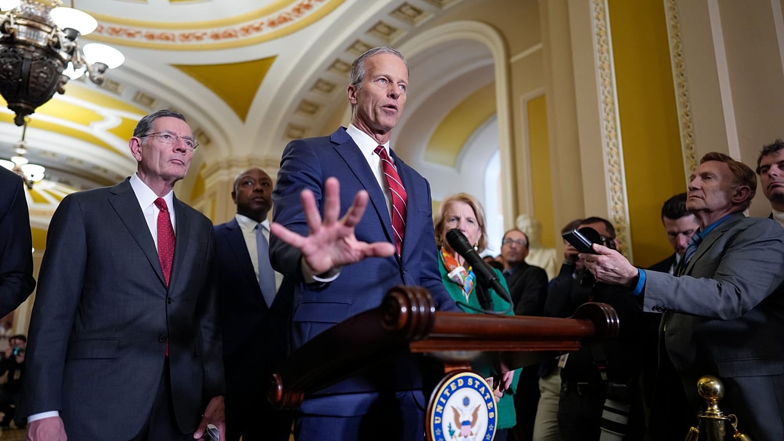 Senate Majority Leader John Thune, R-S.D., joined by Sen. John Barrasso, R-Wyo., the GOP whip, left, talks to reporters at the Capitol, in Washington. 1 April, 2025. 
