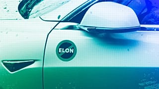 A Tesla vehicle displays an anti-Elon Musk sign near a protest against Tesla and Elon Musk outside a service centre in Seattle, March 2025