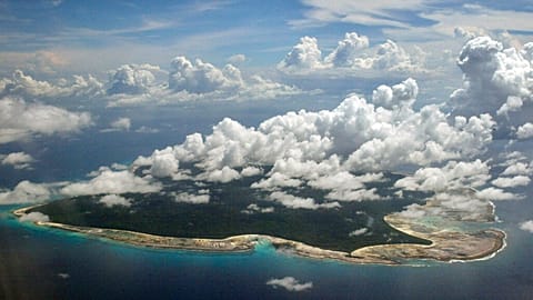 Clouds hang over the North Sentinel Island in India's southeastern Andaman and Nicobar Islands, 14 November, 2005 