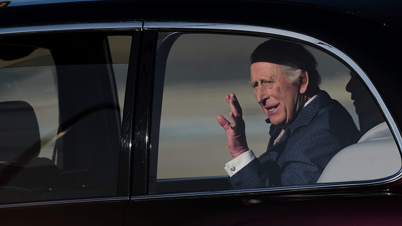 King Charles III waves upon arrival at Rome's International Airport for a four-day official visit to Italy, 7 April, 2025