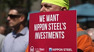 A rally by US Steel employees is held outside the United Steel Tower in downtown Pittsburgh to display their support for the transaction with Nippon Steel. 4 September 2024.