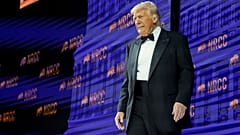President Donald Trump arrives to speak at the National Republican Congressional Committee (NRCC) dinner at the National Building Museum in Washington, Tuesday, April 8, 2025.