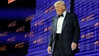 President Donald Trump arrives to speak at the National Republican Congressional Committee (NRCC) dinner at the National Building Museum in Washington, Tuesday, April 8, 2025.