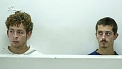 Belgian nationals Lornoy David, left, and Seppe Lodewijckx, right, at the Jomo Kenyatta International Airport Law Courts in Nairobi, 15 April, 2025