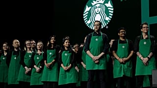 ARŞİV - Starbucks baristaları, Seattle'daki yıllık hissedarlar toplantısı sırasında sahnede, 20 Mart 2019.