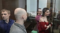 Four Russian journalists accused of working for a group founded by the late Russian opposition politician Alexei Navalny in court in Moscow, 15 April, 2025