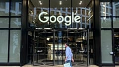 A man walks past Google's offices in London's Kings Cross area, on August 10, 2024.