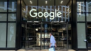 A man walks past Google's offices in London's Kings Cross area, on August 10, 2024.