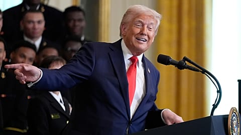 President Donald Trump speaks during the Commander-in-Chief trophy presentation to the Navy Midshipman football team in the East Room of the White House, 15 April, 2025