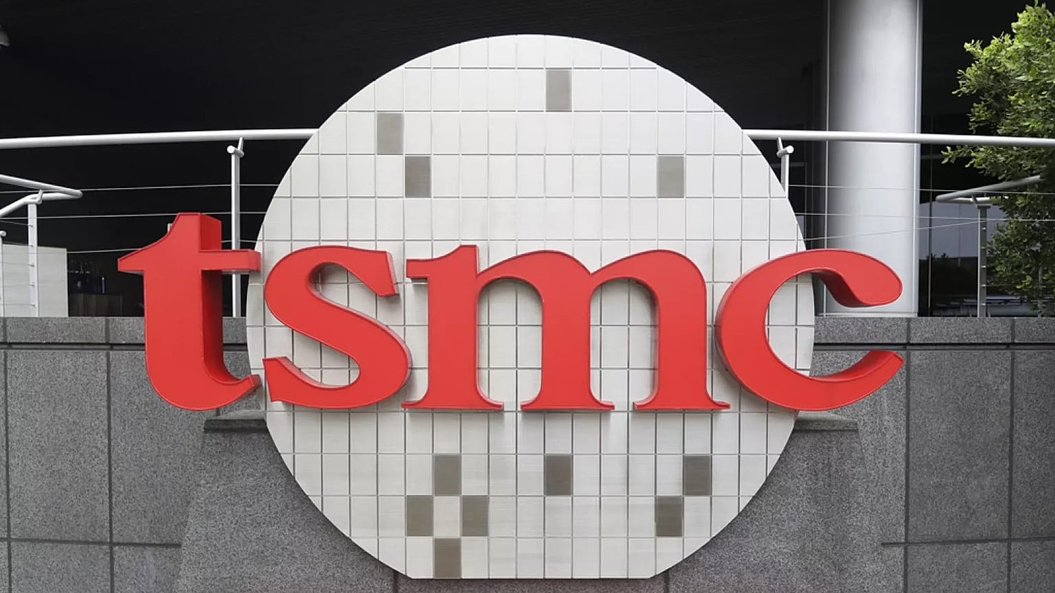 Taiwan Semiconductor Manufacturing Co., Ltd. (TSMC) logo brands the headquarters in Hsinchu, Taiwan, Wednesday, Oct. 20, 2021