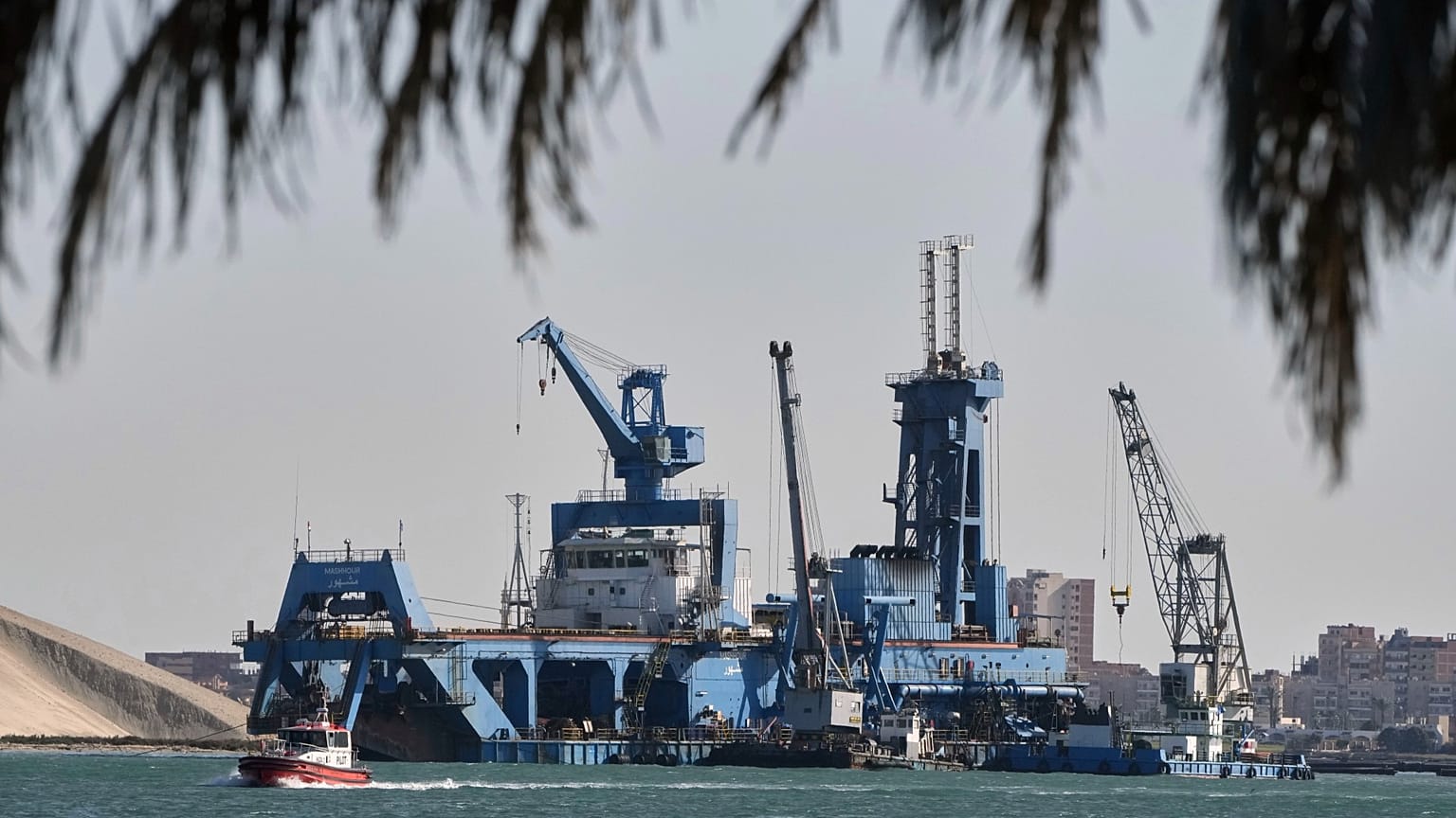 Egyptian dredging ship, Mashhour, sails at the Suez Canal in Ismailia, Egypt, Wednesday, April 16, 2025. 