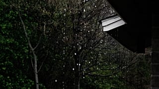 Researchers from the National University of Singapore have used rain-like droplets moving through a tube to generate enough energy to light up 12 LEDs.