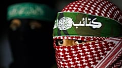أبو عبيدة، المتحدث باسم كتائب القسام، الجناح العسكري لحركة حماس، خلال مؤتمر صحافي في مدينة غزة، يوم الجمعة 26 مارس 2010. 