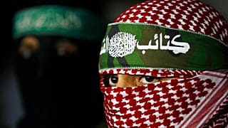أبو عبيدة، المتحدث باسم كتائب القسام، الجناح العسكري لحركة حماس، خلال مؤتمر صحافي في مدينة غزة، يوم الجمعة 26 مارس 2010.