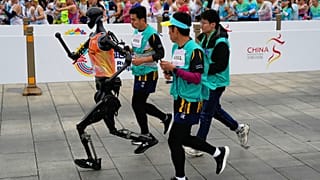 A robot takes part in what is billed as the world's first robot half marathon during the Humanoid Robot Half-Marathon held in Beijing on Saturday, April 19, 2025.