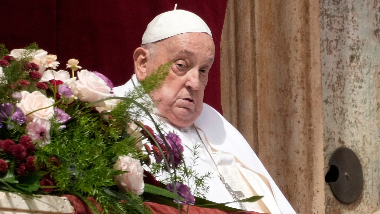 Pope Francis appears on the central lodge of St. Peter's Basilica in St. Peter's Square at the Vatican, 20 April, 2025
