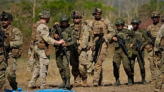 FILE - Filipino and US soldiers participate during a joint military drill called Salaknib at Fort Magsaysay, Nueva Ecija province, northern Philippines on 31 March 2025.