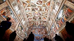 Visitors admire the Sistine Chapel inside the Vatican Museums on the occasion of the museum's reopening, 3 May, 2021