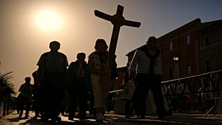 Pilgrims arrive in St. Peter's Square at the Vatican, Tuesday, April 22, 2025. 