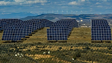 Solar panels work in the town of Milagro, Navarra Province, northern Spain, February 2023.