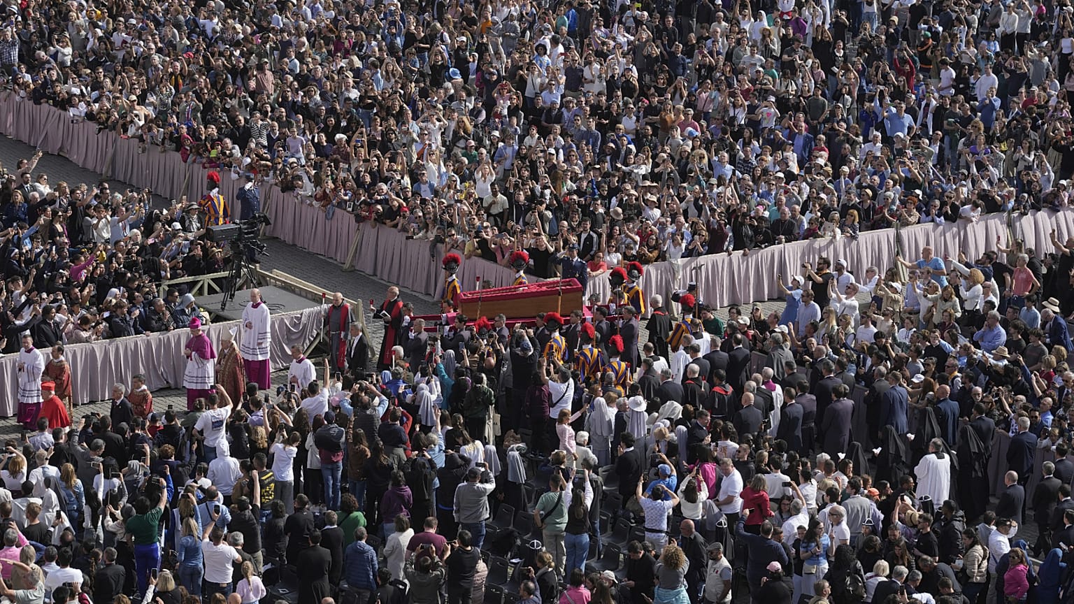 The body of Pope Francis is carried through St Peter's Square to St Peter's Basilica at the Vatican, 23 April, 2025