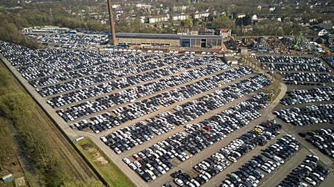New German cars are stored at a logistic center in Essen, Germany, Thursday, March 27, 2025.