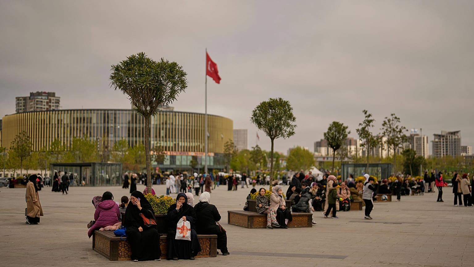 People gather outdoors following an earthquake shock with a preliminary magnitude of 6.2 in Istanbul, 23 April, 2025