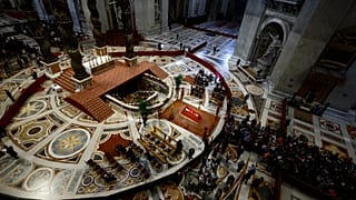 People queue to pay their respect to the late Pope Francis, who will lie in state at St. Peter's Basilica for three days, 23 April, 2025