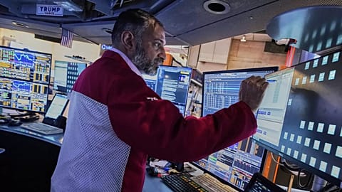Trader Aman Patel works on the floor of the New York Stock Exchange, Wednesday, April 23, 2025.