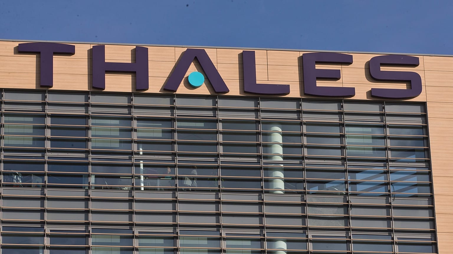 The logo of French defense and aerospace equipment maker Thales SA is pictured in Velizy, outside Paris, France, Wednesday, Sept. 20, 2017. 