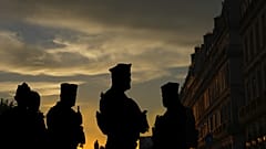 French police officers stand guard in Paris, 11 August, 2024