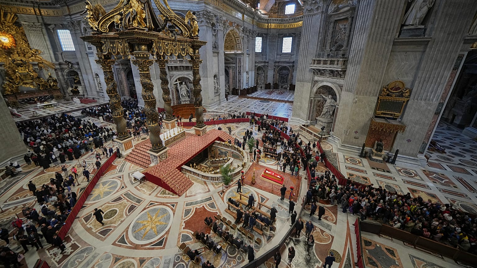 People line up to pay their respects to Pope Francis lying in state at the Vatican, 25 April, 2025