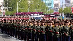 Students of revolutionary schools participate in a commemorative march in the street of Arch of Triumph in Pyongyang, 25 April 2025