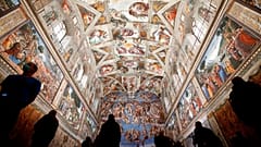 Visitors admire the Sistine Chapel inside the Vatican Museums on the occasion of the museum's reopening, 3 May, 2021