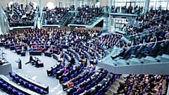 Lawmakers attend the constituent session of the newly elected Bundestag in Berlin, 25 March, 2025