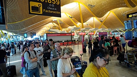 Passengers in the queue at Madrid airport