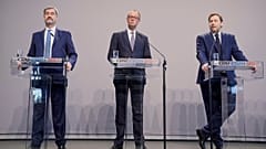Friedrich Merz (στη μέση) κατά την παρουσίαση της συμφωνίας συνασπισμού νωρίτερα αυτό το μήνα.  