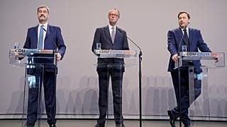 Friedrich Merz (στη μέση) κατά την παρουσίαση της συμφωνίας συνασπισμού νωρίτερα αυτό το μήνα.  