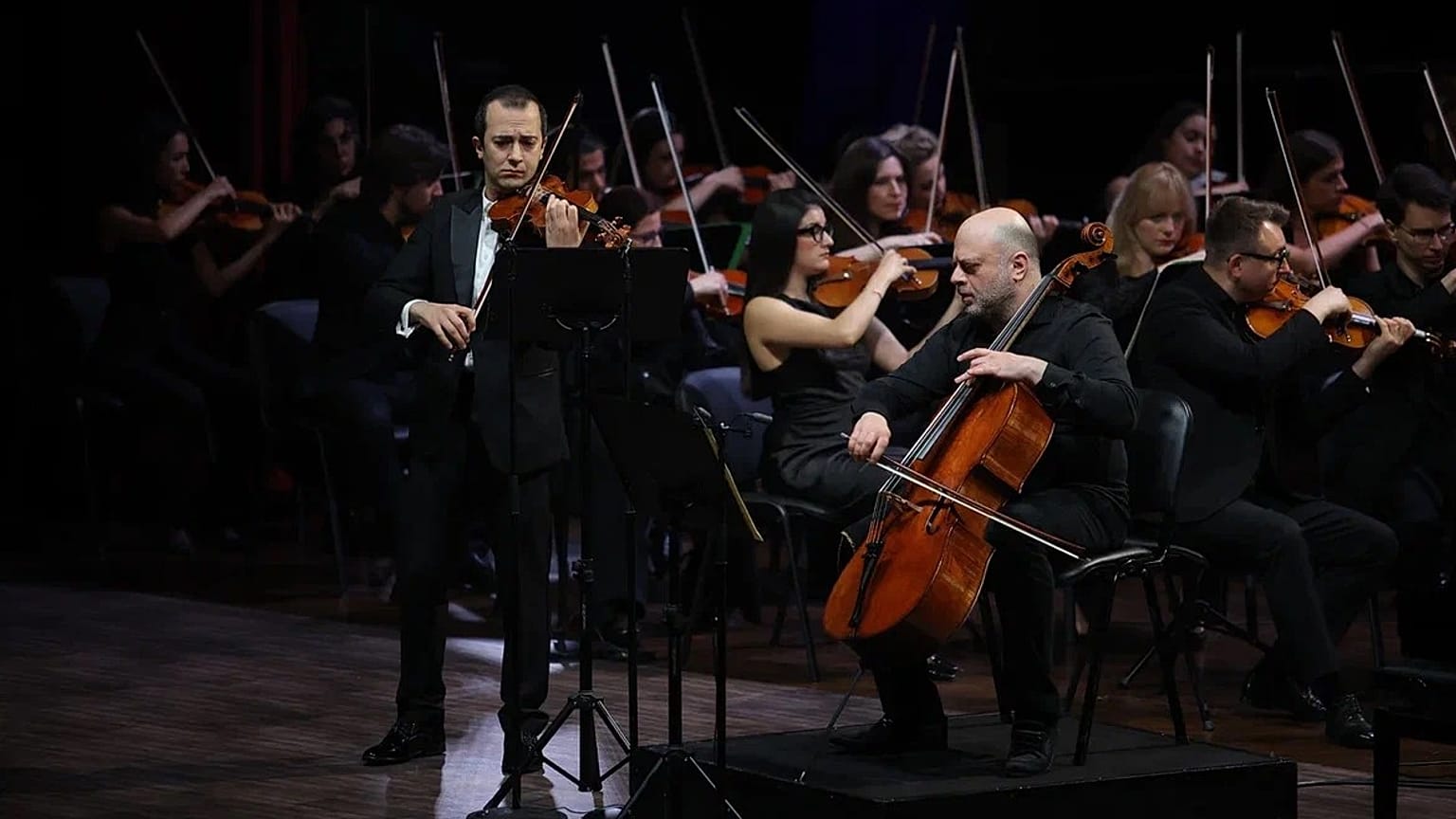 Armenian violinist Haik Kazazyan performs alongside cellist Alexander Chaushian during the final day of the inaugural Classic Violin Olympus in Dubai