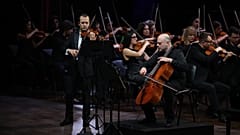 Armenian violinist Haik Kazazyan performs alongside cellist Alexander Chaushian during the final day of the inaugural Classic Violin Olympus in Dubai